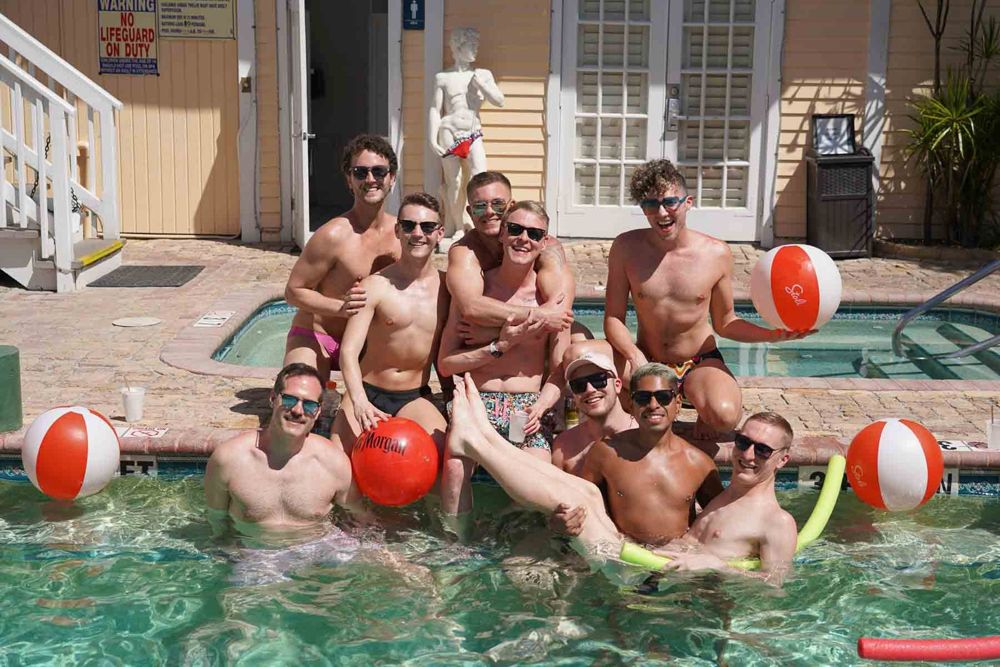 Namaste At Sea travelers gathered in the pool at New Orleans House in Key West