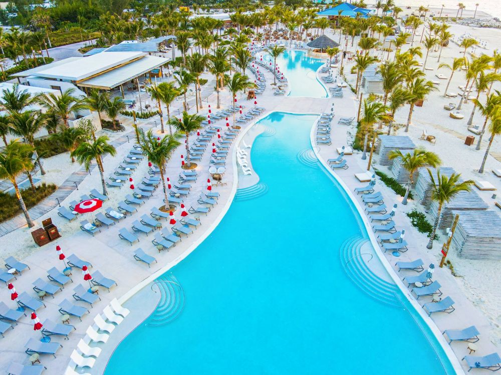 The lagoon-style pool and palm trees at the Beach Club at Bimini