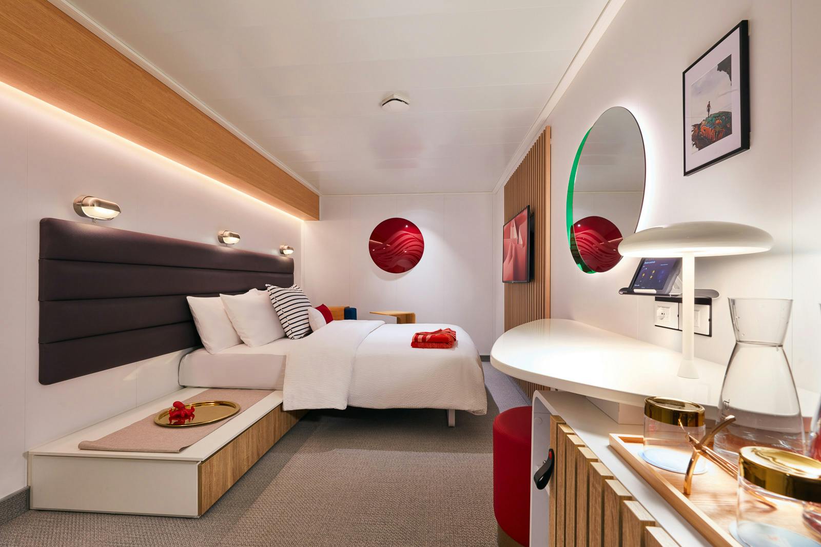 Insider cabin with a double bed and warm modern finishes