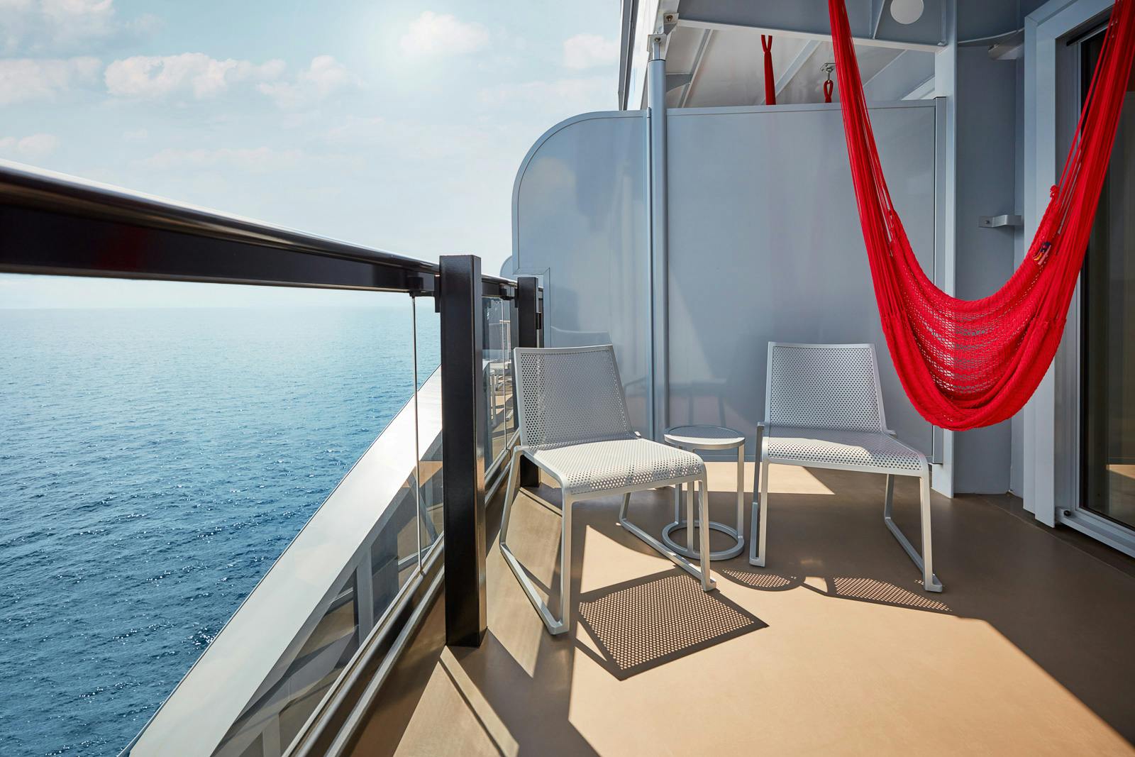 Sea Terrace cabin opening onto a private ocean-view balcony